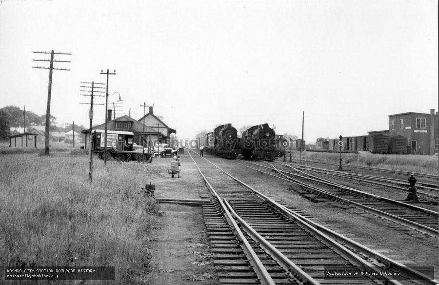 Postcard: Two trains in the station, Rouses Point, New York